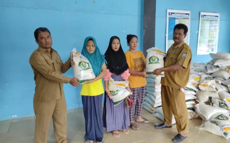 Darto Warsono Kepala Desa Pematang Pasir Bagikan Bapanas ke 262 Kpm